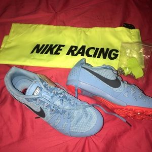 Blue Nike Spikes running shoes + neon bag